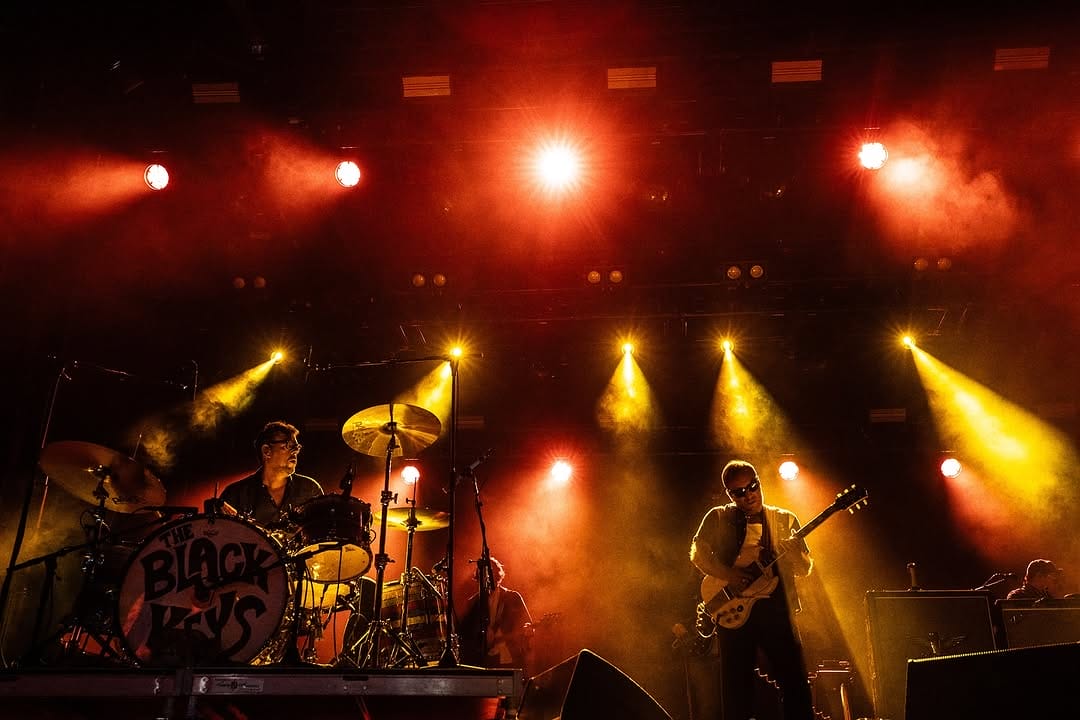 band The Black Keys performing with various instruments.