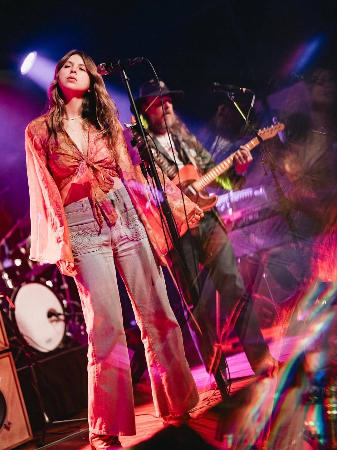 Band performing in a venue.