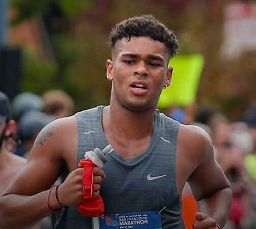 Close up shot of a person running the SF marathon