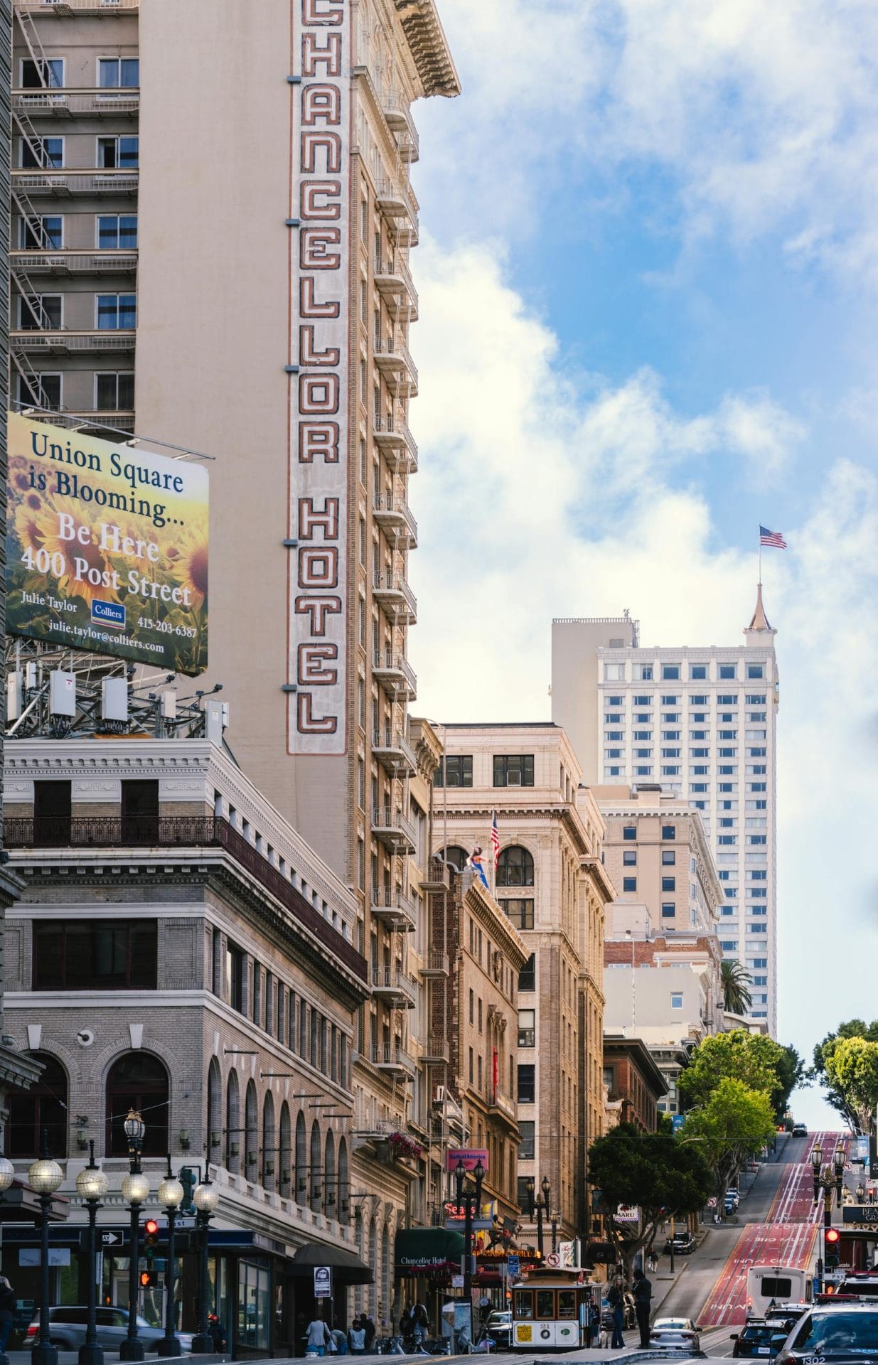 Chancellor Hotel's historic facade in bustling Union Square, San Francisco.