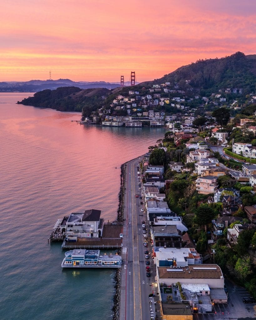 Sausalito waterfront with Golden Gate Bridge view at sunset