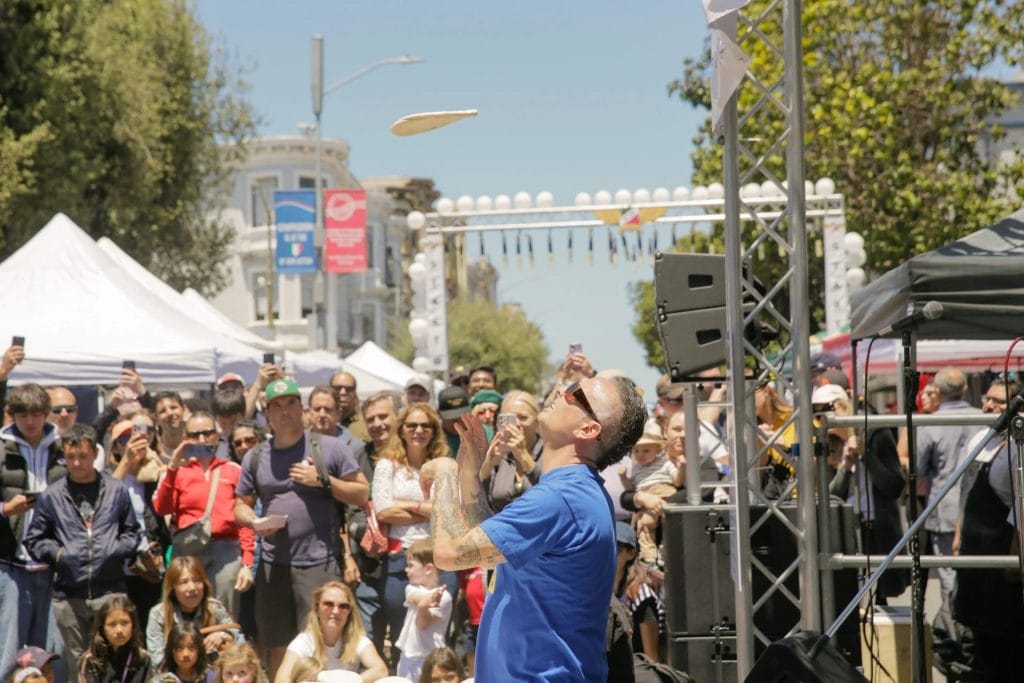 Things To Do in San Francisco This June 2026, with a live street performance and crowd at Festa Italiana in North Beach.
