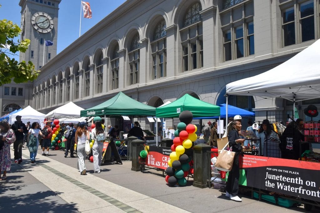 Things To Do in San Francisco This June 2026, with Juneteenth on the Waterfront vendor tents outside the Ferry Building.