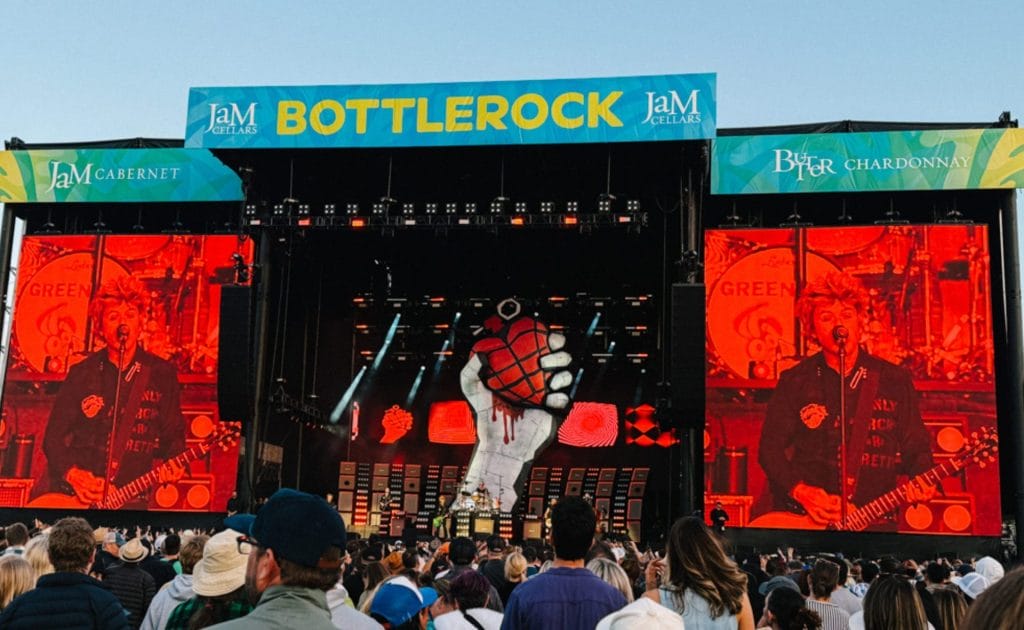 BottleRock 2026 food guide image showing a large festival crowd watching a live performance at the BottleRock Napa Valley stage.