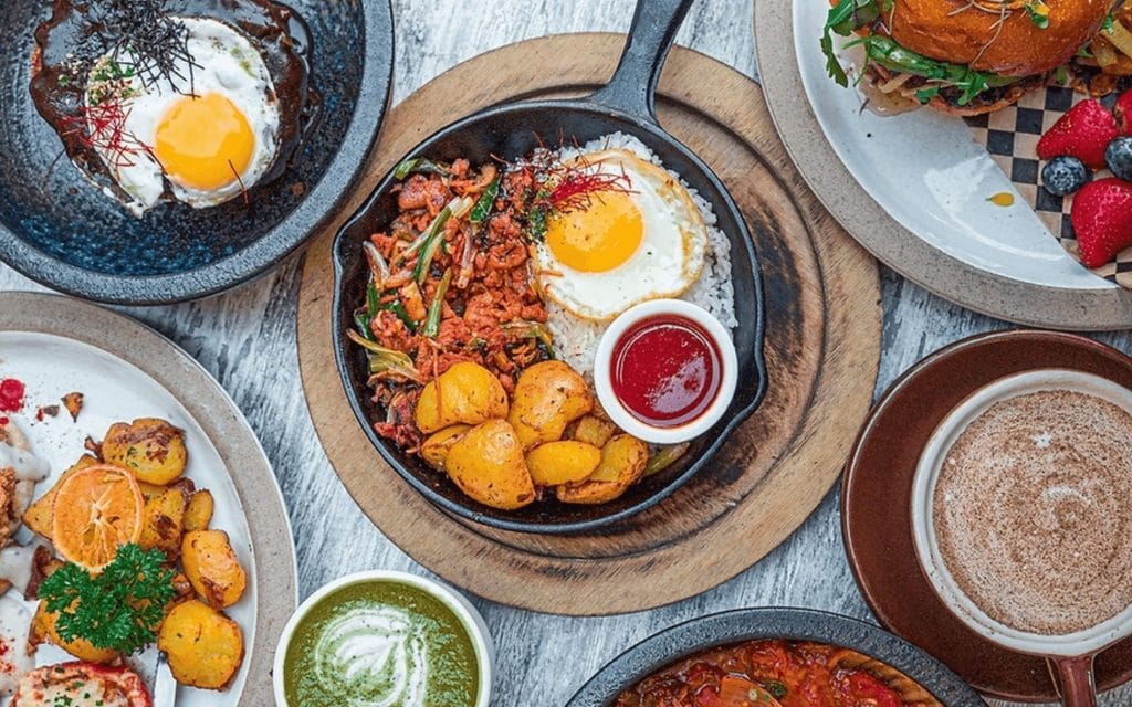 Father’s Day brunch at Surisan in San Francisco, featuring Korean-inspired brunch plates with eggs, potatoes, coffee, and a breakfast sandwich.