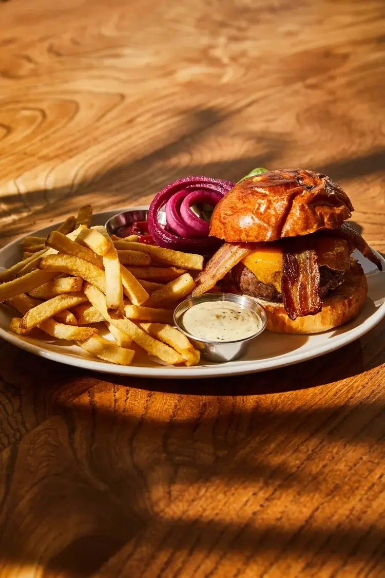 Nopa San Francisco, bacon strips burger with crispy fries and dipping sauce