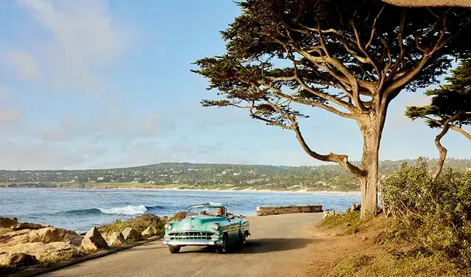 Best hidden gems on highway 1, classic vintage car on the scenic route near Carmel Beach