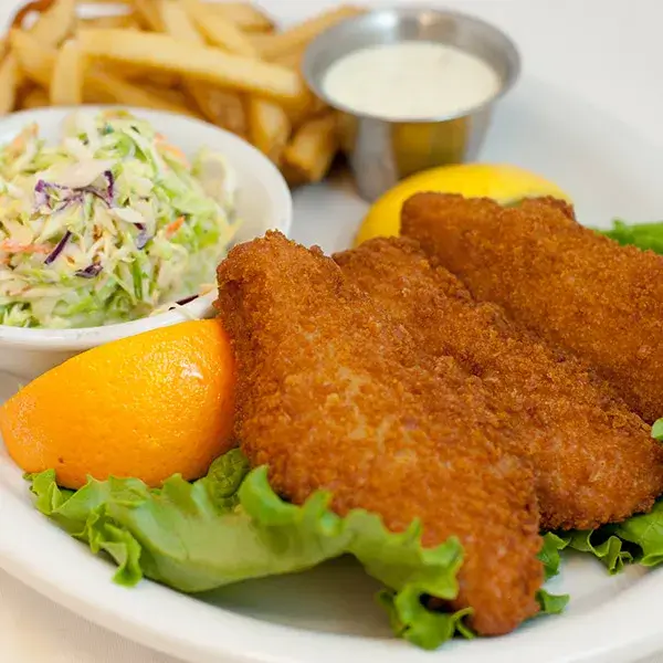 Fish and Chips with a side of salad and fries at Lori's Diner