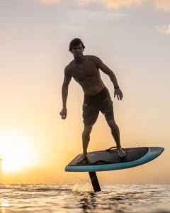 man eFoil surfing on the water